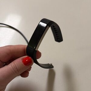 Black Fitbit Alpha Fitness Tracker